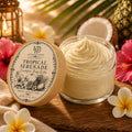 Tropical Serenade Emulsified Body Butter with pineapple, coconut, hibiscus and plumeria in warm island light